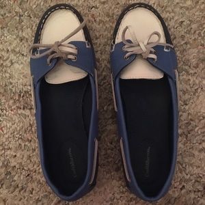 Tie up blue and white moccasin shoes